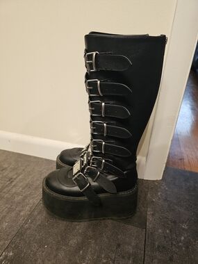 Demonia Black Buckled Platform Knee-High Boots